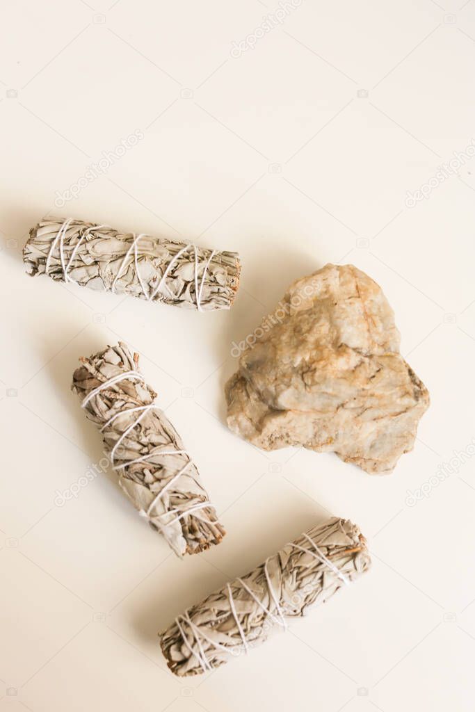 Incense white sage, California dry sage on a white background. Mystical background