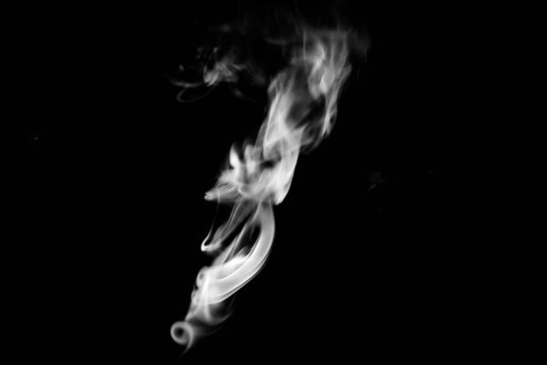 Smoke clouds on a black background, white patterns from vape and cigarettes, art photos, soft focus and texture blurring