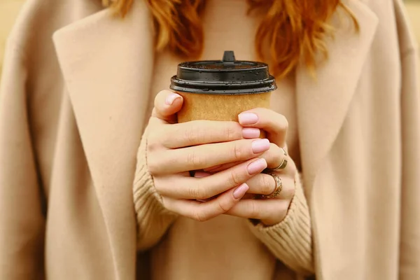 Craft coffee cup in the hands of a girl, coffee with you