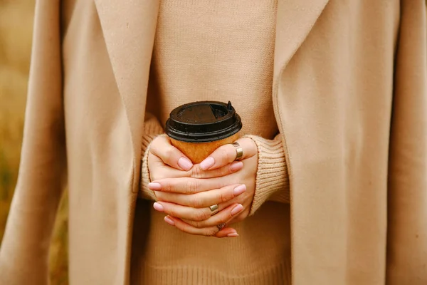Craft coffee cup in the hands of a girl, coffee with you
