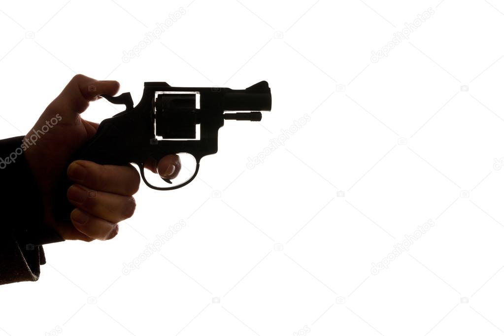 man shooting a handgun