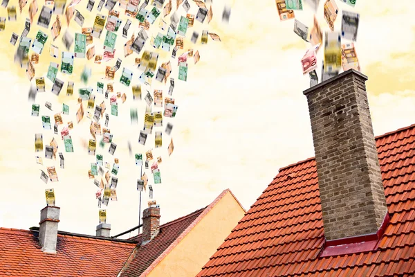 A lot of euro money flies up the chimneys — Stock Photo, Image