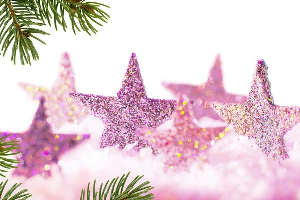 Рождественский фон с фиолетовыми звездами и рождественской веточкой — стоковое фото