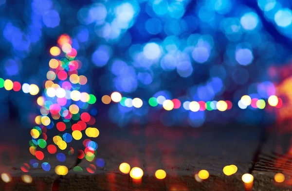 Blå bakgrund med julgran — Stockfoto