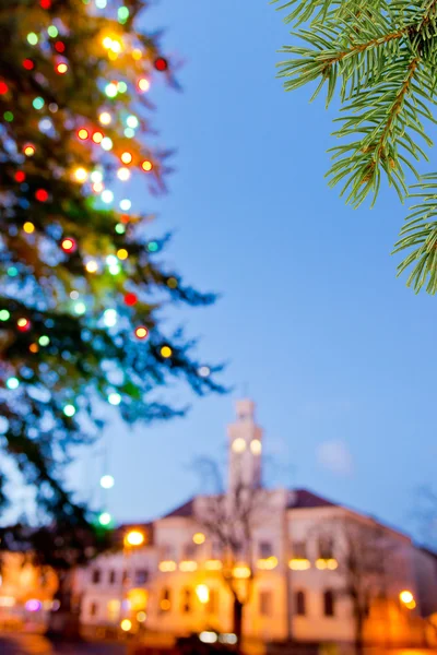 Christmas twig with christmas tree in the town — Stock Photo, Image