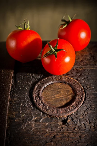 Drie rode tomaten — Stockfoto