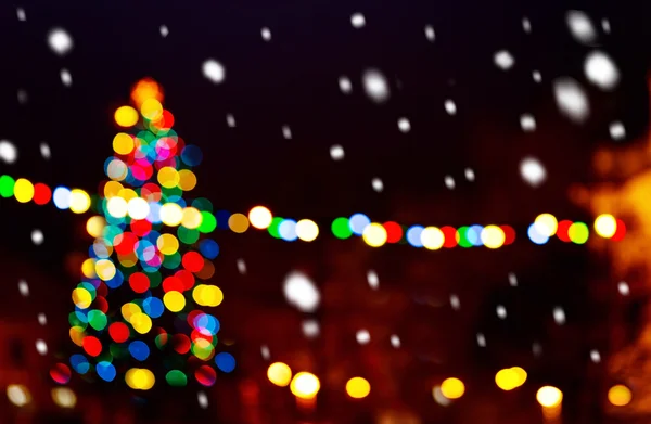 Christmas tree i the snowfall — Stock Photo, Image