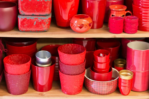 Red flowerpots in the florist store — Stock Photo, Image