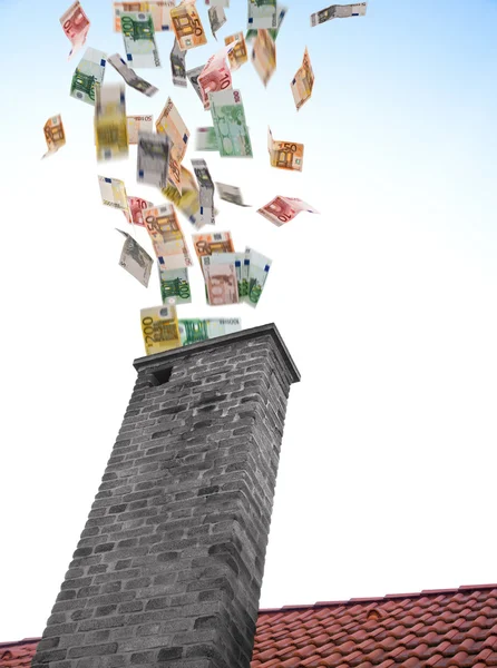 Euros flies down the chimney — Stock Photo, Image