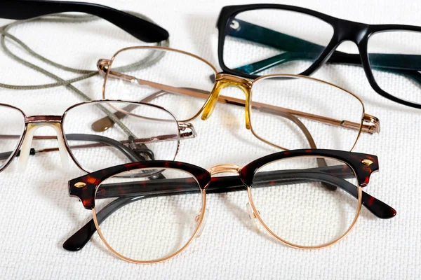 Reading glasses on the white table — Stock Photo, Image