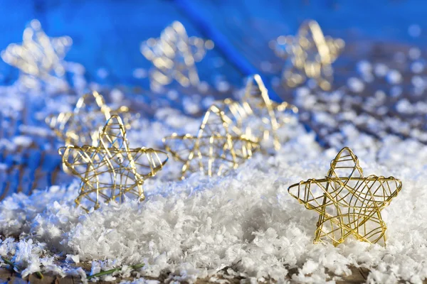 Christmas stars in the snow — Stock Photo, Image