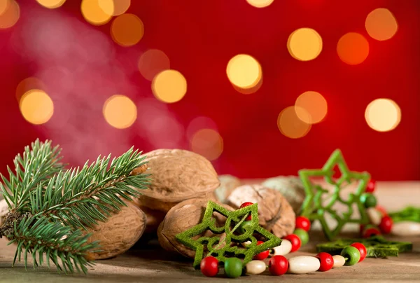 Nueces con ramita de Navidad —  Fotos de Stock