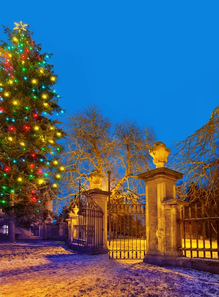 Christma tree with old gateway ,Town of Postoloprty, Czech Republic — Stock Photo, Image