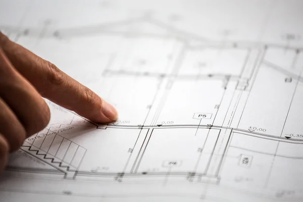 Pointing to specific place on architectural sketches — Stock Photo, Image