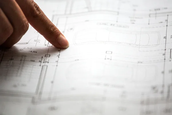 Pointing to specific place on architectural sketches — Stock Photo, Image