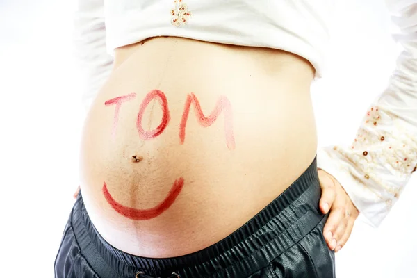 Вагітні мами очікував сина назвали Том. — стокове фото