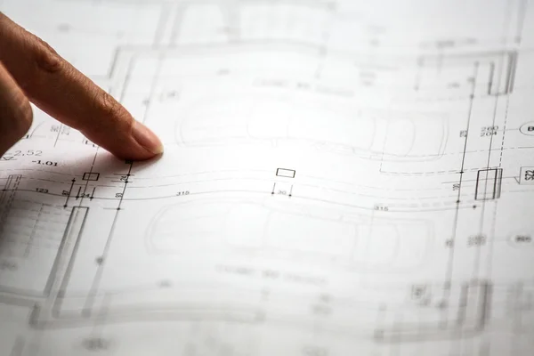 Pointing to specific place on architectural sketches — Stock Photo, Image