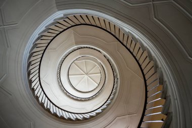Beautiful winding staircase in old tenement house in Warsaw, Poland