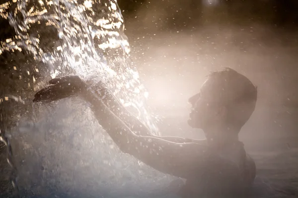 Young woman relaxing in thermal pool. — Stock Photo, Image