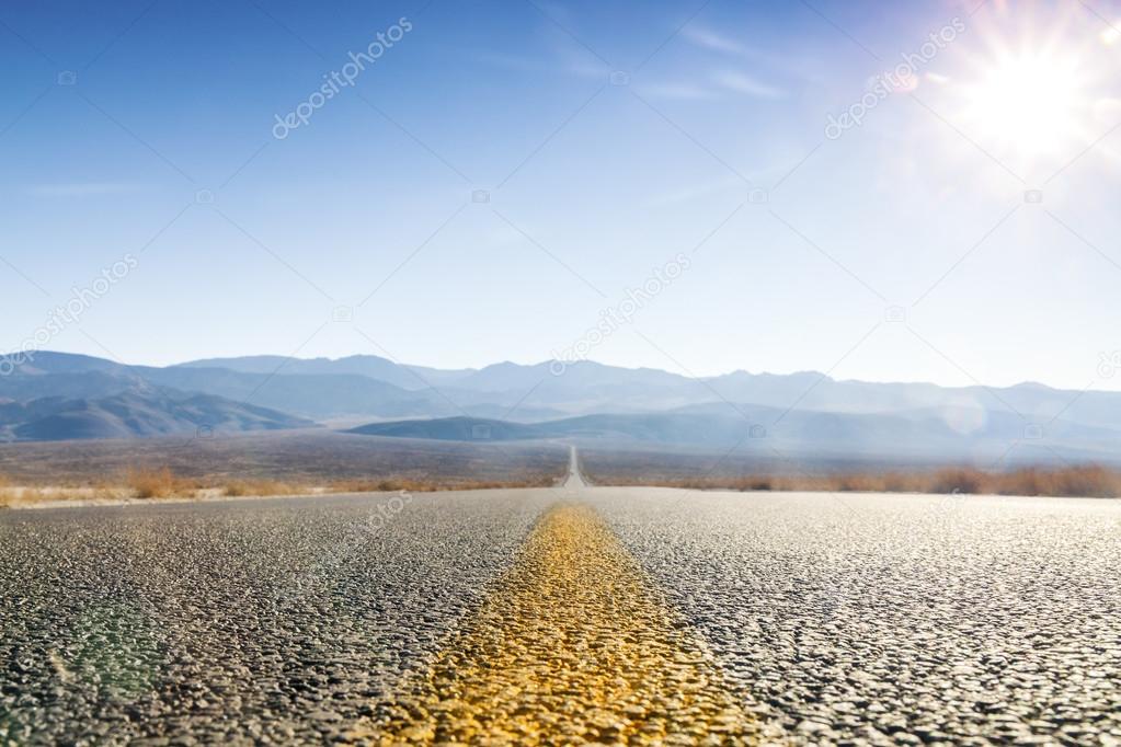 Straight road through desert