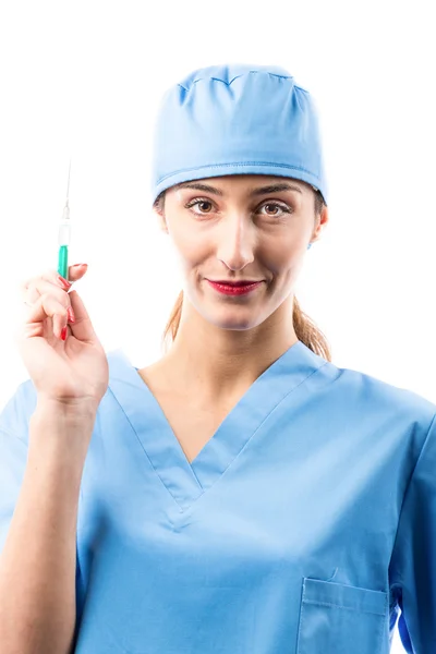 Een verpleegster met spuit in haar hand. — Stockfoto