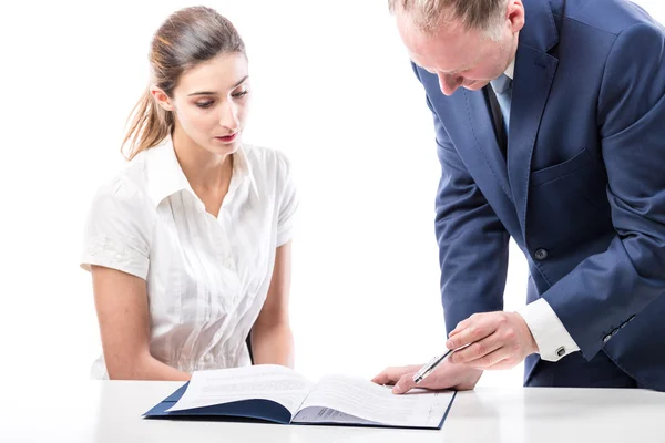 Businessman and businesswoman signing a papers — Stock Photo, Image