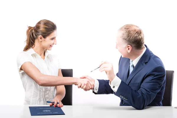 Businessman and businesswoman signing a papers — Stock Photo, Image