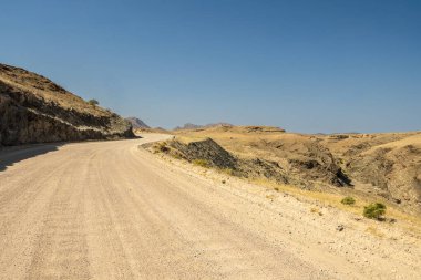 Big Daddy Dune and Deadvlei, Namibia is Towering red dune above Deadvleis ancient dead camelthorn trees and white clay pan.