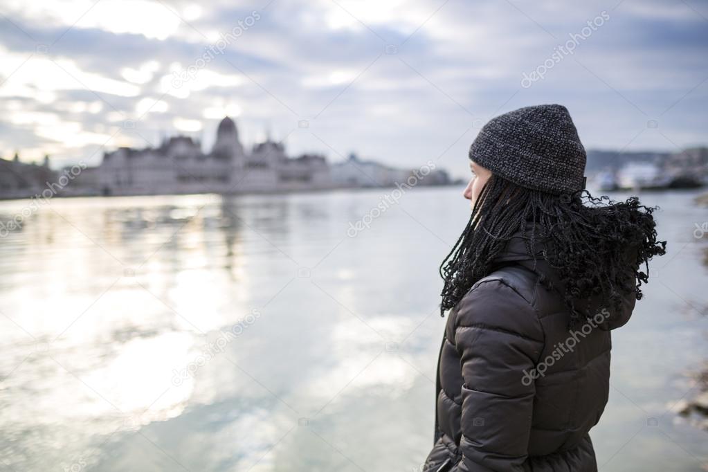 Young woman thinking about serious matters