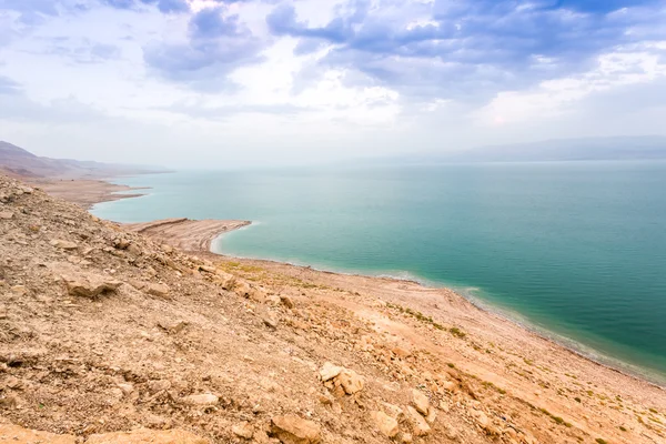 Døde havkyst ved tusmørke, Israel - Stock-foto