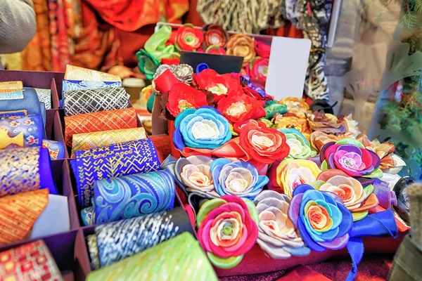 Festive handmade ties and flower brooches at Riga Christmas mark — Stock Photo, Image