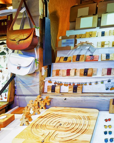 Handmade wooden and leather souvenirs at Riga Christmas Market — Stock Photo, Image