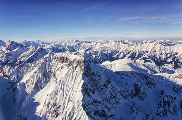 Jungfrau regio helikopter weergave in de winter — Stockfoto