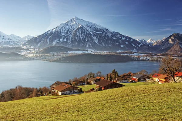 Panoramic lakeview in Swiss mountains near the Thun lake in wint