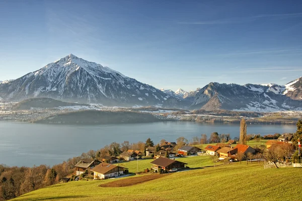 Swiss Alps peaks and lake view near Thun lake in winter