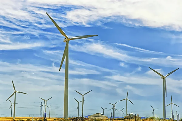 Wind turbines in front of blue sky — Stock Photo, Image
