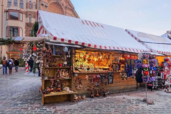 Christmas market stall with traditional souvenirs for sale — 图库照片