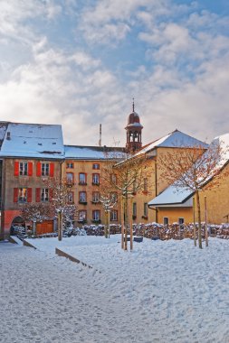 Beautiful medieval buildings of the town of Gruyeres covered wit