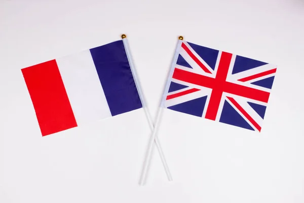 Francouzská Vlajka Vlajka Velké Británie Křížily Bílém Pozadí Izolovaný Obrázek — Stock fotografie