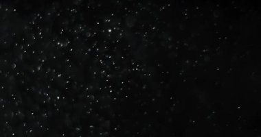 soyut toz parçacıklarının üzerinde koyu arka plan döngü sorunsuz hazır