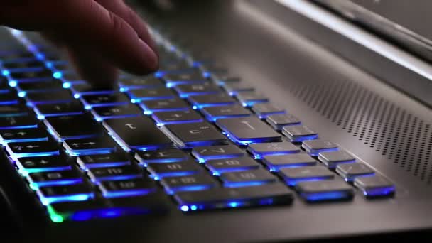 Man typing on notebook keyboard — Stock Video