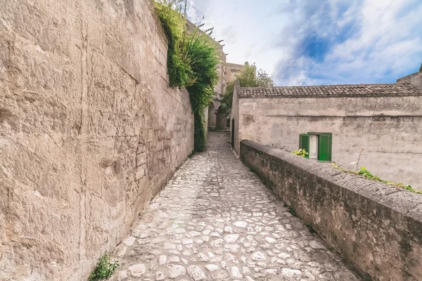 Typical old street view of Matera under blue sky — Stock Photo, Image