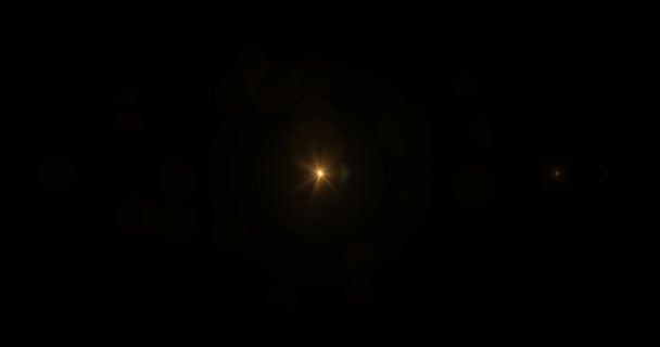 Cor quente dourada brilhantes raios de chama da lente piscam vazamento para transição — Vídeo de Stock