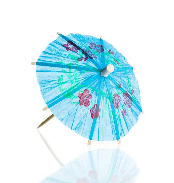 Blue cocktail umbrella isolated against white background — Stock Photo, Image