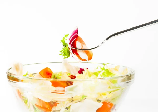 Fork on italian fresh salad on white — Stock Photo, Image