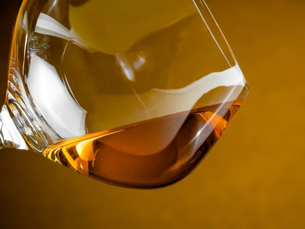 Snifter of brandy in elegant glass with space for text — Stock Photo, Image
