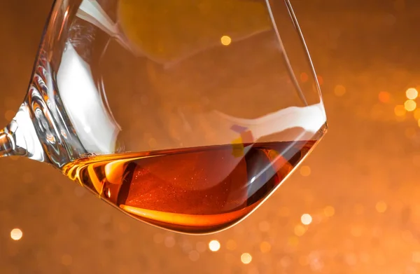 Snifter of brandy in elegant glass with space for text — Stock Photo, Image