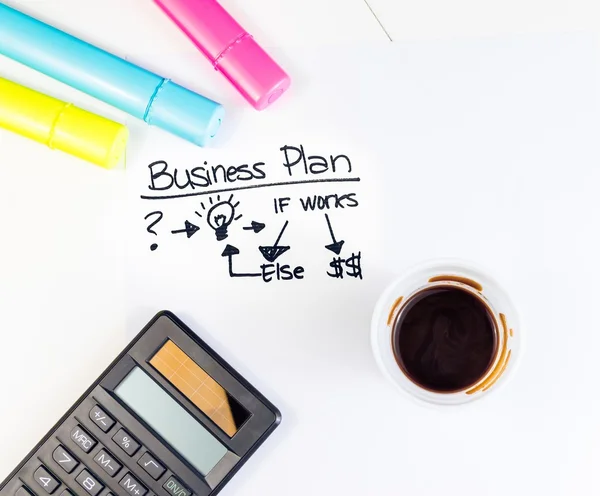 Business plan words near highlighters, calculator and cup of coffee, business concept — Stock Photo, Image