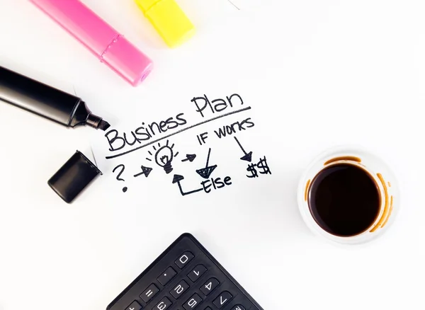 Business plan words near highlighters, calculator and cup of coffee, business concept — Stock Photo, Image