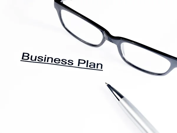 Business plan words near glasses and pen, business concept — Stock Photo, Image